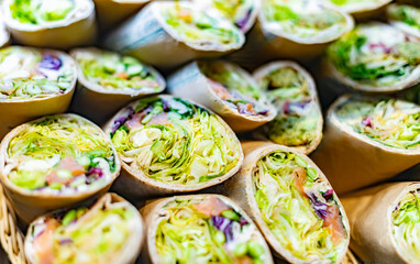 Freshly prepared tortilla wraps sold in a fast food restaurant