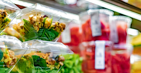 Ready to eat meals displayed in a commercial refrigerator