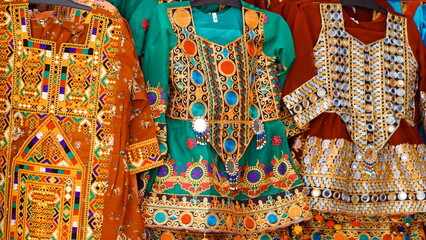 Traditional Embroidered Attire. Richly Decorated Garments Displaying Ethnic Craftsmanship and...