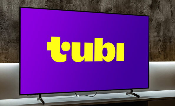 Flat-screen TV set displaying logo of Tubi