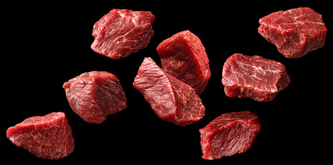 Raw beef meat pieces isolated on white background