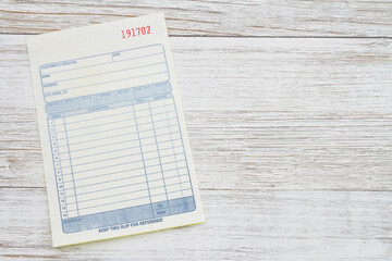 Business customer receipt on a desk