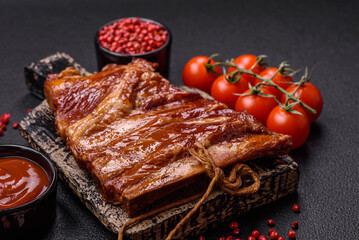 Delicious smoked or grilled ribs with olives, spices and herbs