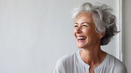 Elegant senior woman Elderly Gray-haired beautiful woman laughing and smiling Older woman with healthy face and white teeth - obrazy, fototapety, plakaty