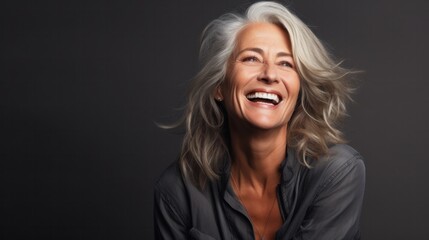 Elegant senior woman Elderly Gray-haired beautiful woman laughing and smiling Older woman with healthy face and white teeth - obrazy, fototapety, plakaty