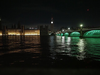 Houses of Parliament and Westminster Bridge at night in London - 749403149