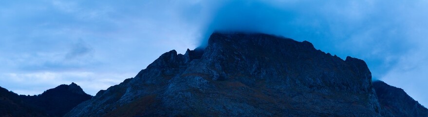 Aerial drone view of the sunset on Mount Amboto in the Urkiola Natural Park. Arrazola Valley....