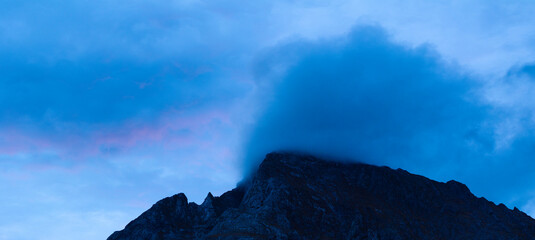 Aerial drone view of the sunset on Mount Amboto in the Urkiola Natural Park. Arrazola Valley....