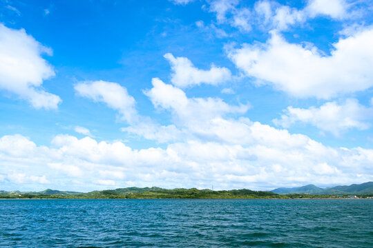 Blue sea on a sunny day. Portrait. Looc Fish Sanctuary, Romblon, Philippines