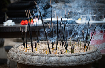 Burning Incense Sticks at Temple