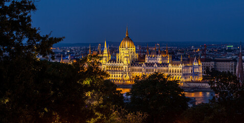 Fototapeta na wymiar Night View of the Hungarian Parliament from the Fisherman's Bastion in Budapest