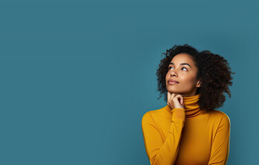 Woman Looking Up into Copy Space and Thinking