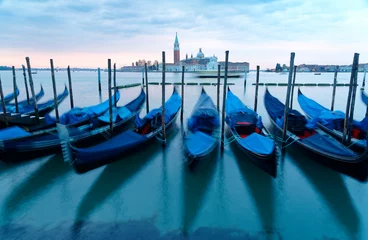 Foto op Canvas Early morning scenery of Venice with San Giorgio Maggiore Church in the background & gondolas parking on the Grand Canal in blue twilight, viewed from St Mark's Square in Venezia, Italy, Europe © AaronPlayStation