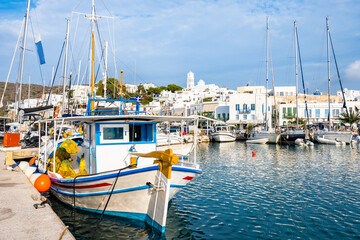Traditional Greek fishing boat in Adamas port, Milos island, Cyclades, Greece - 749448703