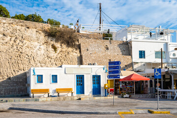 Traditional buildings in Adamas port, Milos island, Cyclades, Greece - 749448704