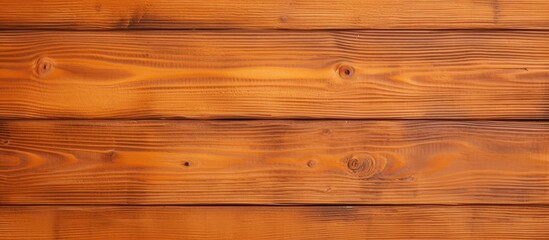 Fototapeta premium A detailed view of an orange wooden plank wall, showcasing the texture and grains of the wood. Each plank is tightly fitted together, creating a seamless appearance.