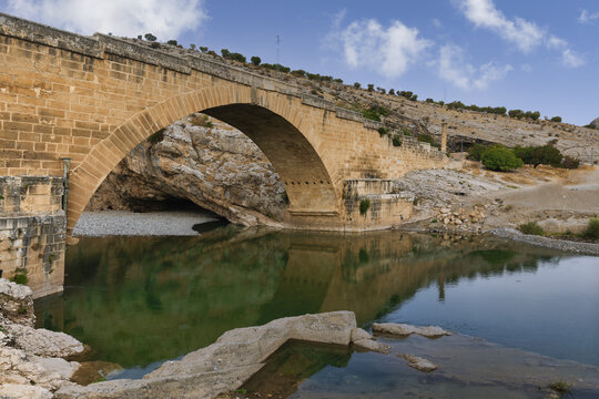 2nd century AD Severan roman bridge on the Cendere River with the columns of the Roman Emperor Septimus Severus and the Empress Julia Domna, Turkey