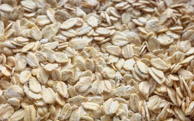 Close up photo of oat flakes, selective focus, food background.