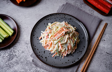 Japanese kani salad with fresh vegetables and crab sticks