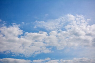 Naklejka na ściany i meble Light blue sky with clouds