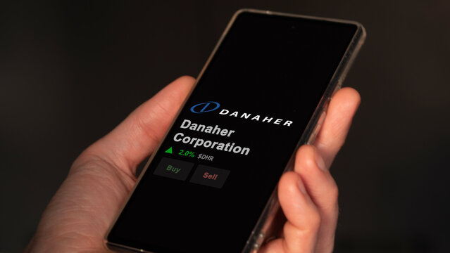March 02nd 2024 Washington, D.C.. The logo of Danaher Corporation on the screen of an exchange. Danaher Corporation price stocks, $DHR on a device.