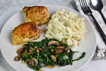 chicken thighs with sauteed spinach and mushrooms