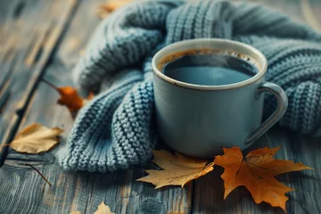 Fototapeten Autumn fall leaves hot steaming cup of cof © Abdul