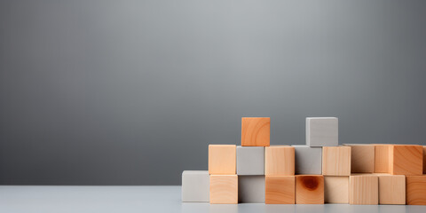 wooden cube blocks in pyramid structure on a grey background, Ai generated image