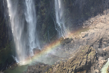 Fototapeta na wymiar Rainbow at the base of Victoria Falls
