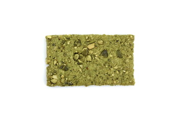 Green Healthy snack: cereal crunchy multigrain cereal flax seed pumpkin, coriander, sunflower seeds protein bread bar. Protein albumen source. Salted diet crispy crackers. Wholemeal.