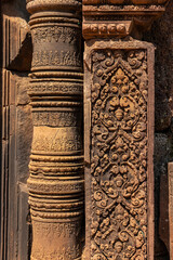 Bas-relief of Banteay Srei, the temple known for its beautiful carvings on red sandstone in Siem Reap, Cambodia. - 749499148