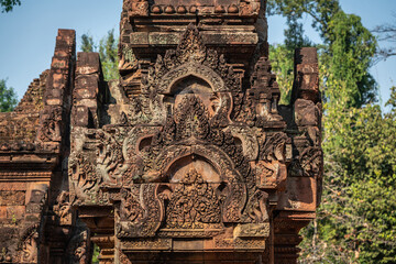Bas-relief of Banteay Srei, the temple known for its beautiful carvings on red sandstone in Siem Reap, Cambodia. - 749499397