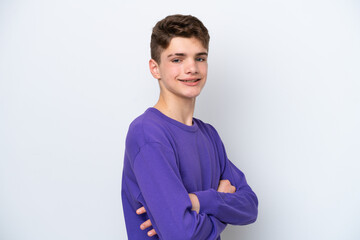 Teenager Russian man isolated on white background with arms crossed and looking forward