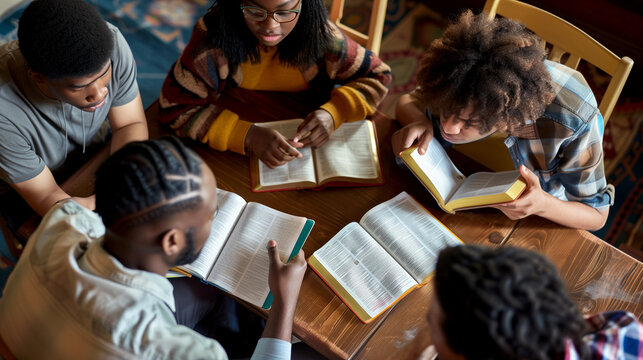 SMALL GROUP BIBLE STUDY: A Group of Diverse Individuals Sitting Around a Table with Open Bibles, Discussing Scripture.