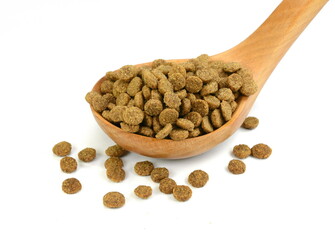 Pile of Dry Pet Food isolated on white background. Dog or cat food isolated.