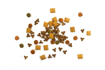 Pile of Dry Pet Food isolated on white background. Dog or cat food isolated.