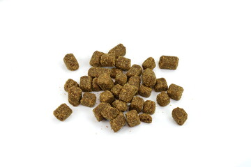 dry dog or cat food isolated on white.