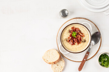 White cream soup with bacon
