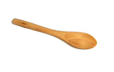 Empty wooden spoon isolated on white background. Natural kitchenware
