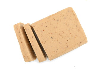 Chestnut puree isolated on white background. Chestnut puree, butter, brick. Chestnut puree bar.