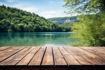 Deurstickers The empty wooden jetty in the foreground with a blurred background of Plitvice lakes © Fancy Imagination