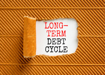 Long-term debt cycle symbol. Concept words Long-term debt cycle on beautiful white paper. Beautiful brown background. Business Long-term debt cycle concept. Copy space.