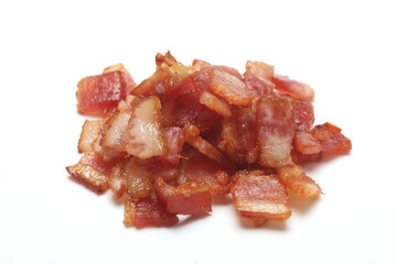 Pieces of bacon fried on a white background