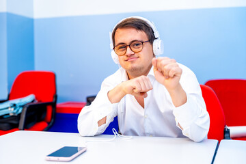 Man with down syndrome listening to music with phones