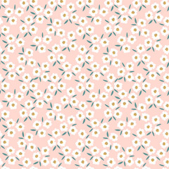 Floral millefleur seamless pattern. Cute boho tiny flower ornament on pink backdrop. Naive art meadow flowers background. Doodle style vector illustration for textile, wallpaper, wrapping paper.
