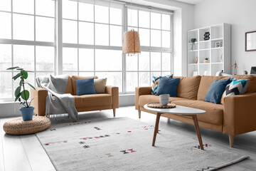 Interior of modern living room with orange sofas