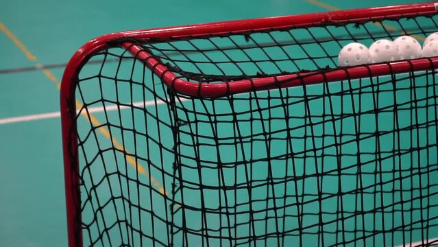 Scoring in floorball: Ball Hits the Goal Net in slow motion