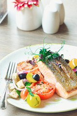 grilled fish salmon with vegetables, color food, healthy, tomatoe, olive, fresh food, serving , restaurant