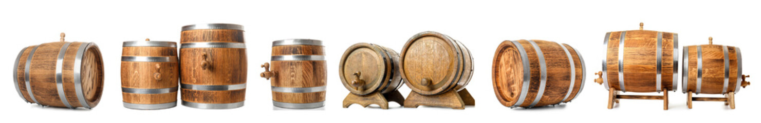 Fototapeta premium Set of wooden barrels on white background