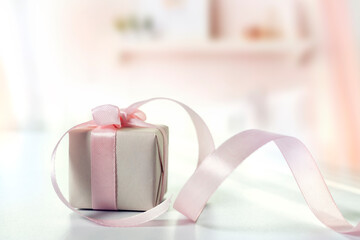 Mother's day, women's day. Present box holiday design. Gift box decorated with pink ribbon.